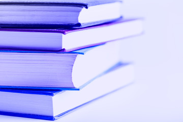 Books collection in pile on background