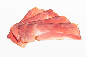 Hamon sliced on white background. Spanisch traditional meat.