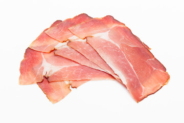 Hamon sliced on white background. Spanisch traditional meat.