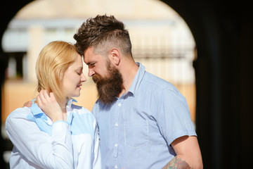 Quite moments together. Couple in love on summer day. Sensual woman and bearded man enjoy romantic date. Loving couple of woman and hipster dating outdoor. Feeling love and romance