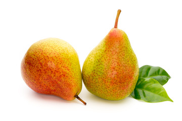 Fresh bio pear with leaves on isolated white background.