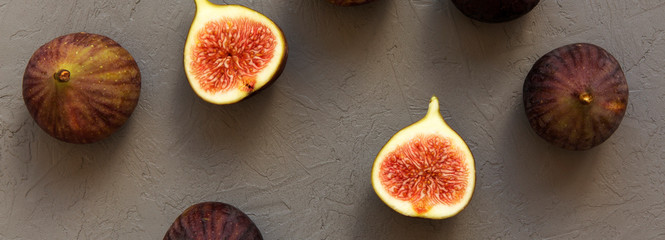 Fresh figs on gray background, top view. Overhead, from above.