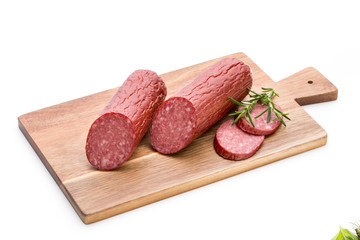 Salami smoked sausage, basil leaves on white background cutout.