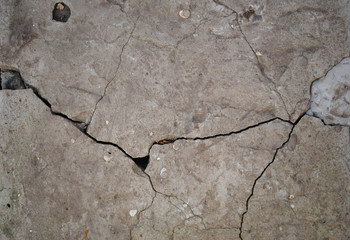 Obraz premium Texture of cracked gray concrete