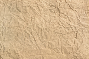 Crumpled old vintage paper background and the texture.