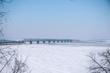Bridge over the frozen river in Cherkassy