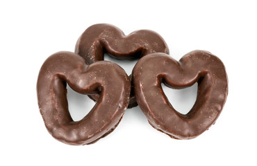 .heart shaped chocolate chip cookie on white background