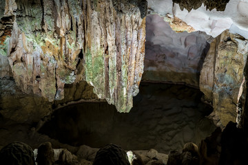 Cave deep dark inside. Underground of stone rock mountain. Ha Long Vietnam nature background