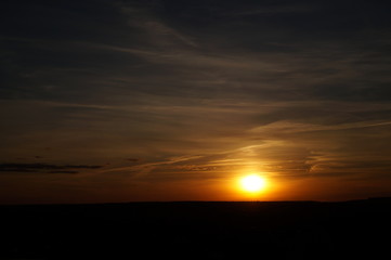 Fototapeta na wymiar Sunset silhouette of church cross at sunset
