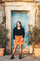 Outdoor portrait of asian plus size model