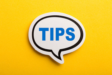 Tips Speech Bubble Isolated On Yellow Background