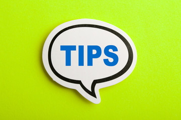 Tips Speech Bubble Isolated On Yellow Background