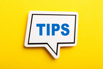 Tips Speech Bubble Isolated On Yellow Background