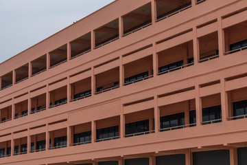 In front of the new building in the school.