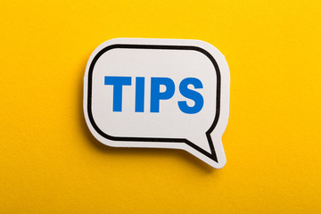 Tips Speech Bubble Isolated On Yellow Background