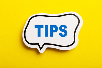 Tips Speech Bubble Isolated On Yellow Background