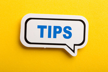 Tips Speech Bubble Isolated On Yellow Background