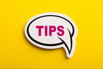 Tips Speech Bubble Isolated On Yellow Background