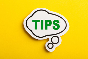 Tips Speech Bubble Isolated On Yellow Background