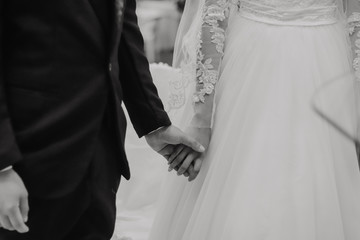 hands of the bride and groom