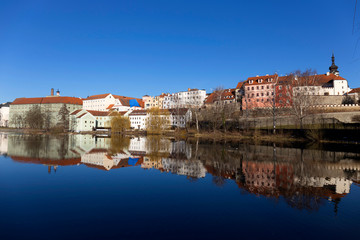 Fototapeta na wymiar Sunny winter royal medieval Town Pisek with the Castle above the river Otava, Czech Republic 