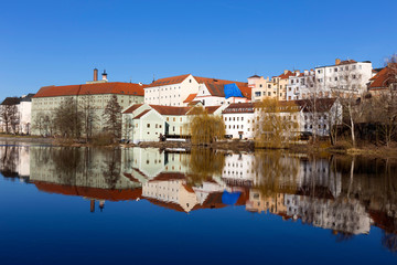 Fototapeta na wymiar Sunny winter royal medieval Town Pisek above the river Otava, Czech Republic 