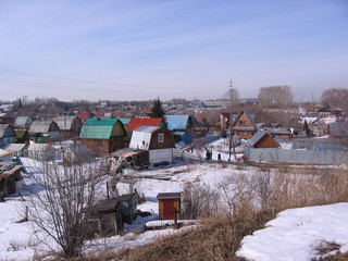 Fototapeta na wymiar view of the suburban village of old, historical, low-rise, buildings wooden houses winter Novosibirsk