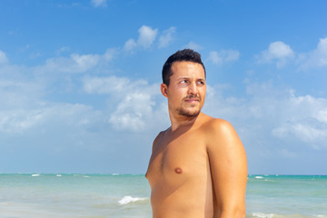 Young man portrait at the  beach