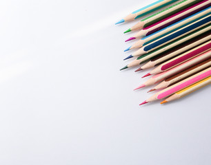 Naklejka premium Colored pen on white background