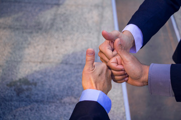 Business teamwork.They are join hands  mean teamwork  and spirit.together, develop,connection.Photo concept My partner Business and Success.