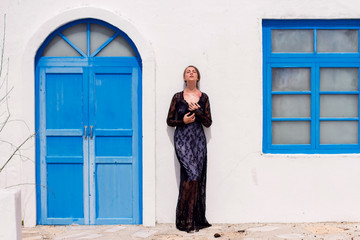 girl in the architecture of greece santorini