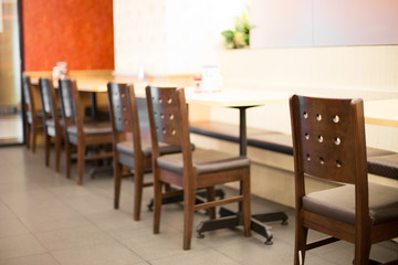 Blurred of Table and chairs in the restaurant