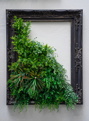 old wood frame with green grass inside on white background.