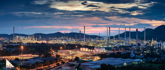 Beautiful sunset  petrochemical oil refinery factory plant cityscape of Chonburi province at night...