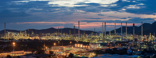 Beautiful sunset  petrochemical oil refinery factory plant cityscape of Chonburi province at night ...