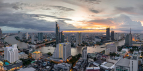 beautiful sunset curve Chao Phraya River panoramic Cityscape of Bangkok city at night , panorama the Metropolis Bangkok City downtown urban landscape Thailand