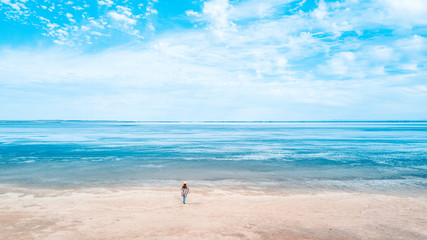 Person and Lake Landscape. Aerial View to show the vastness of the lake