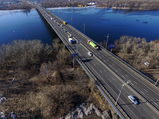 Moscow Bridge across Dnepr River, photo from drone at winter. Kiev,Ukraine