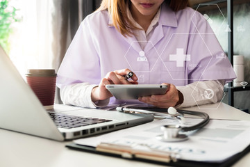 Medicine doctor hand working with modern digital tablet computer interface as medical network...