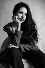 Black and white portrait of the emotional young girl