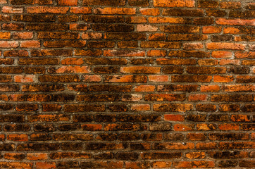 Old red brick wall background.