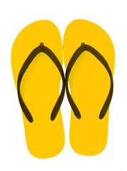 Yellow flip flops isolated on white background.