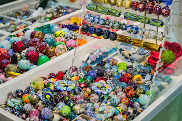 Colorful mix of lampwork glass beads. Variety of shapes and colors to make necklaces or bracelets....