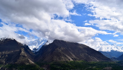 Clouds and the mountain forest landscape. Mountain range nature landscape. Mountain layers landscape.