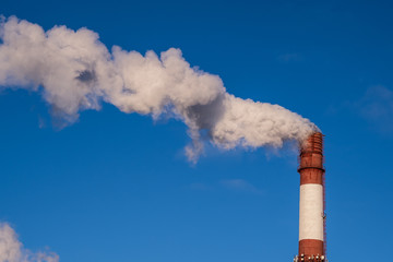 Pollution and smoke from chimneys of factory or power plant