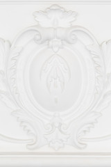 Beautiful ornate white decorative plaster moldings in studio