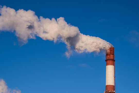 Pollution and smoke from chimneys of factory or power plant