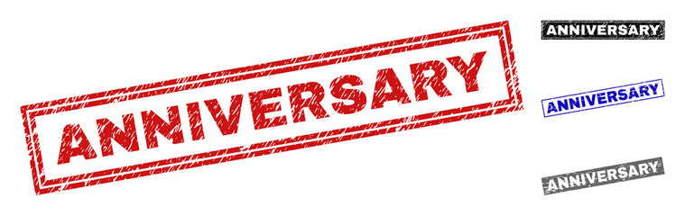 Grunge ANNIVERSARY rectangle stamp seals isolated on a white background. Rectangular seals with grunge texture in red, blue, black and gray colors.