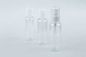 set of cosmetic bottles isolated on white background. Selective focus.