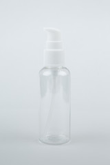 Empty Clear Bottle isolated on white background. Cosmetic. Spa